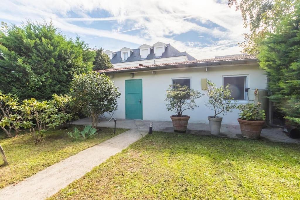 Maisonnette Dans Jardin Partage Colombes  Bagian luar foto
